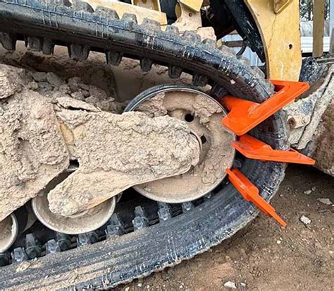 changing tracks on a skid steer|changing tracks on skid steer.